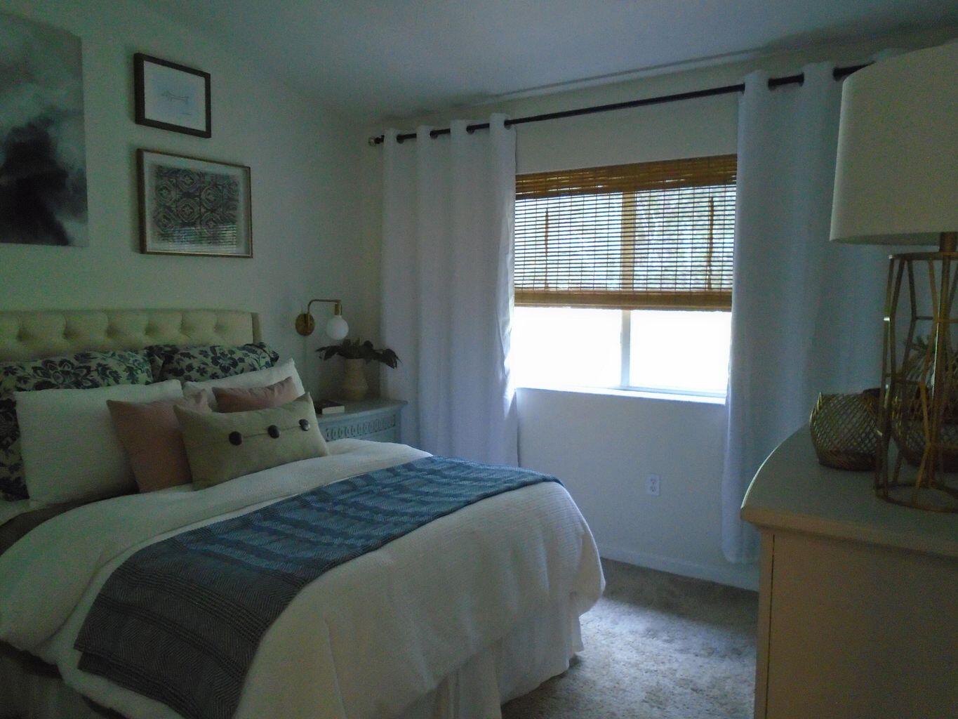 3760 North Jog Road, Unit 204 West Palm Beach, FL 33411 - Photo 20 of 28 a bedroom with bed and a window