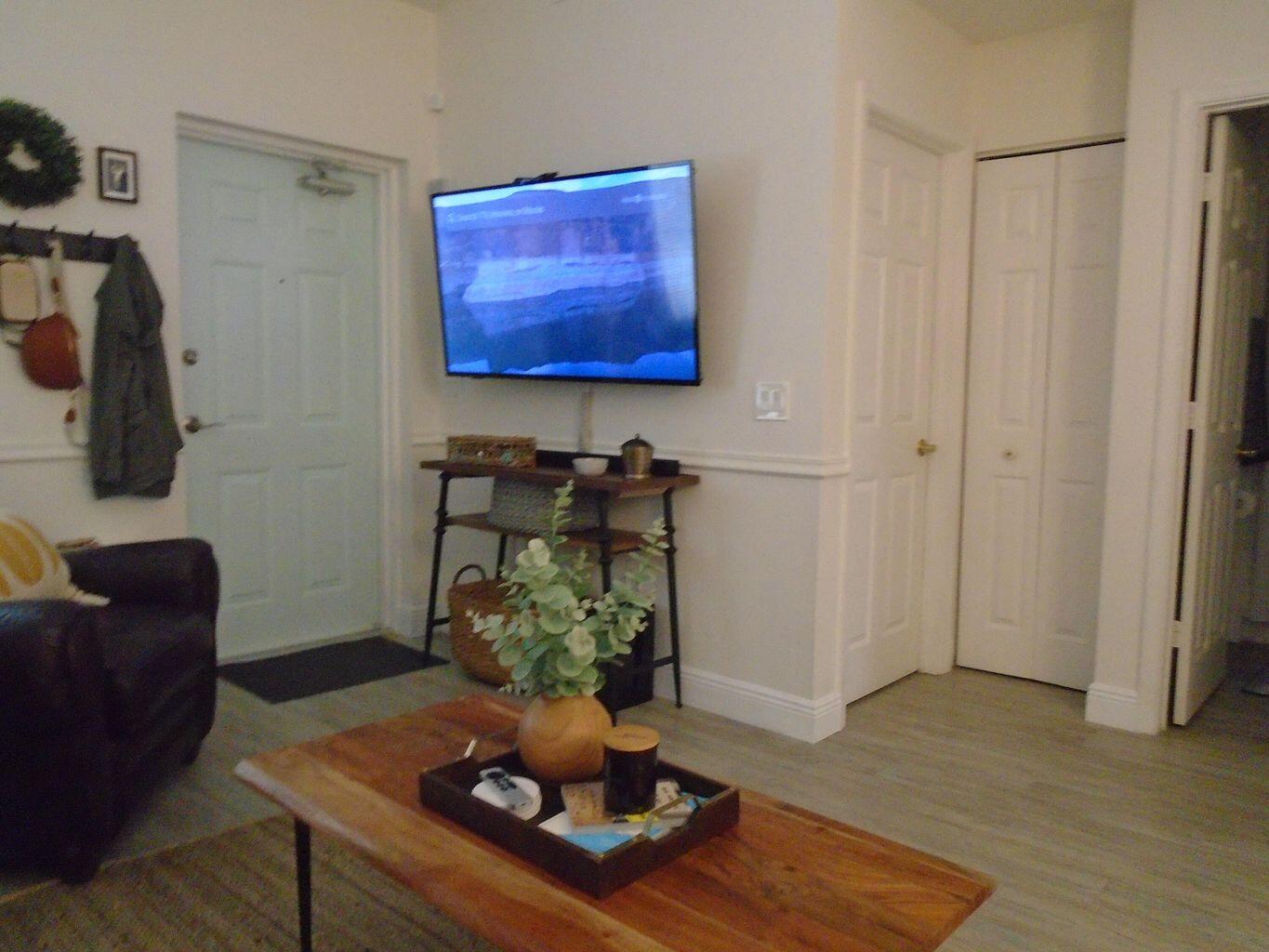 3760 North Jog Road, Unit 204 West Palm Beach, FL 33411 - Photo 6 of 28 a living room with furniture and a potted plant