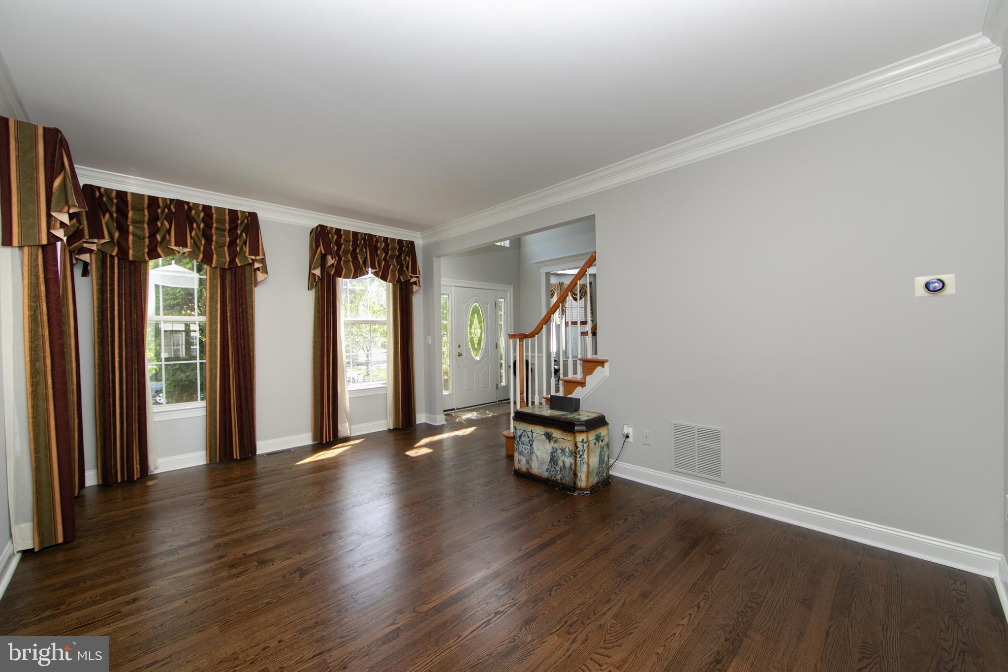 7 Kyle Court Mount Laurel, NJ 08054 - Photo 16 of 67 an empty room with wooden floor and windows