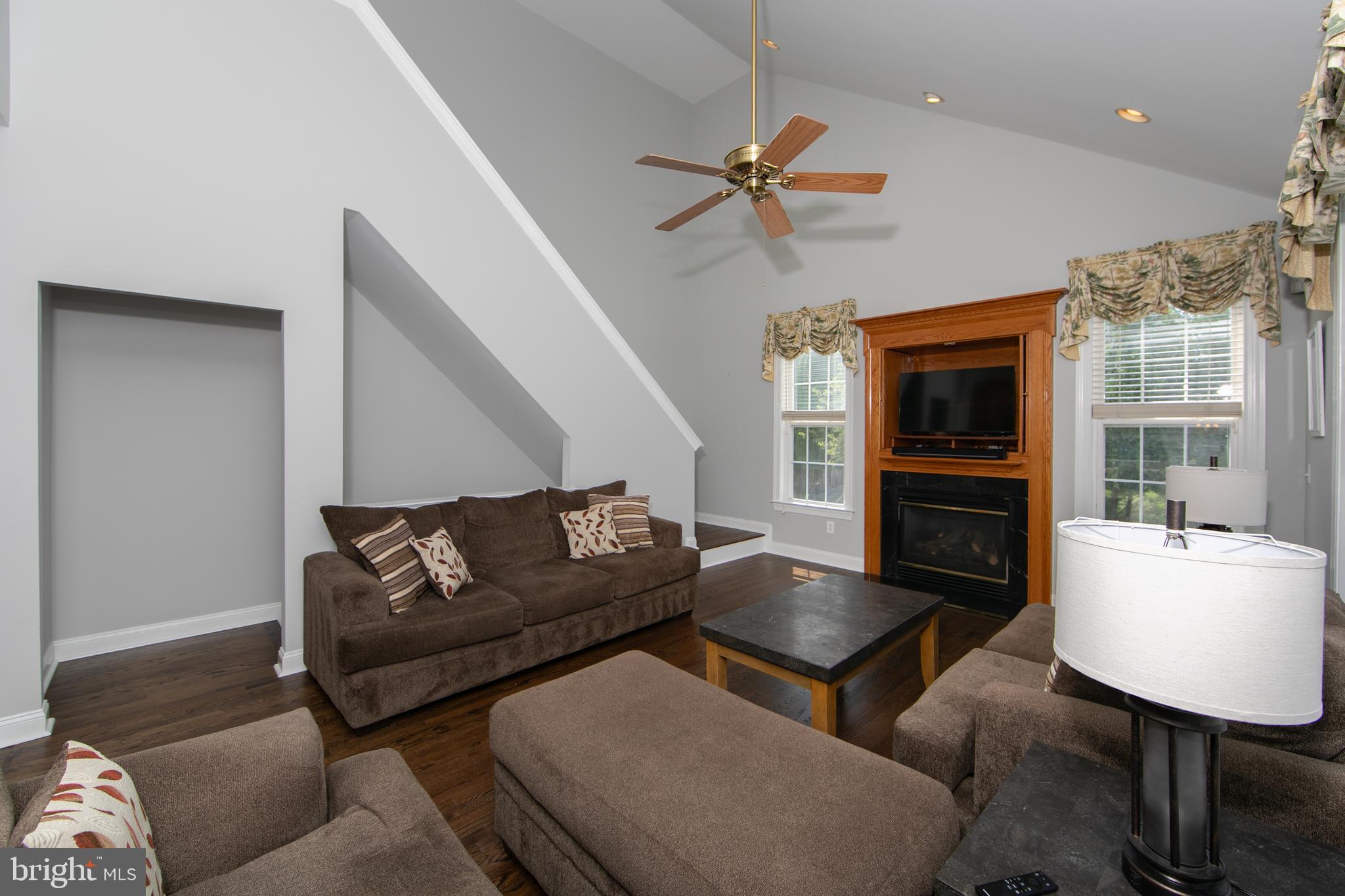 7 Kyle Court Mount Laurel, NJ 08054 - Photo 27 of 67 a living room with furniture and a flat screen tv