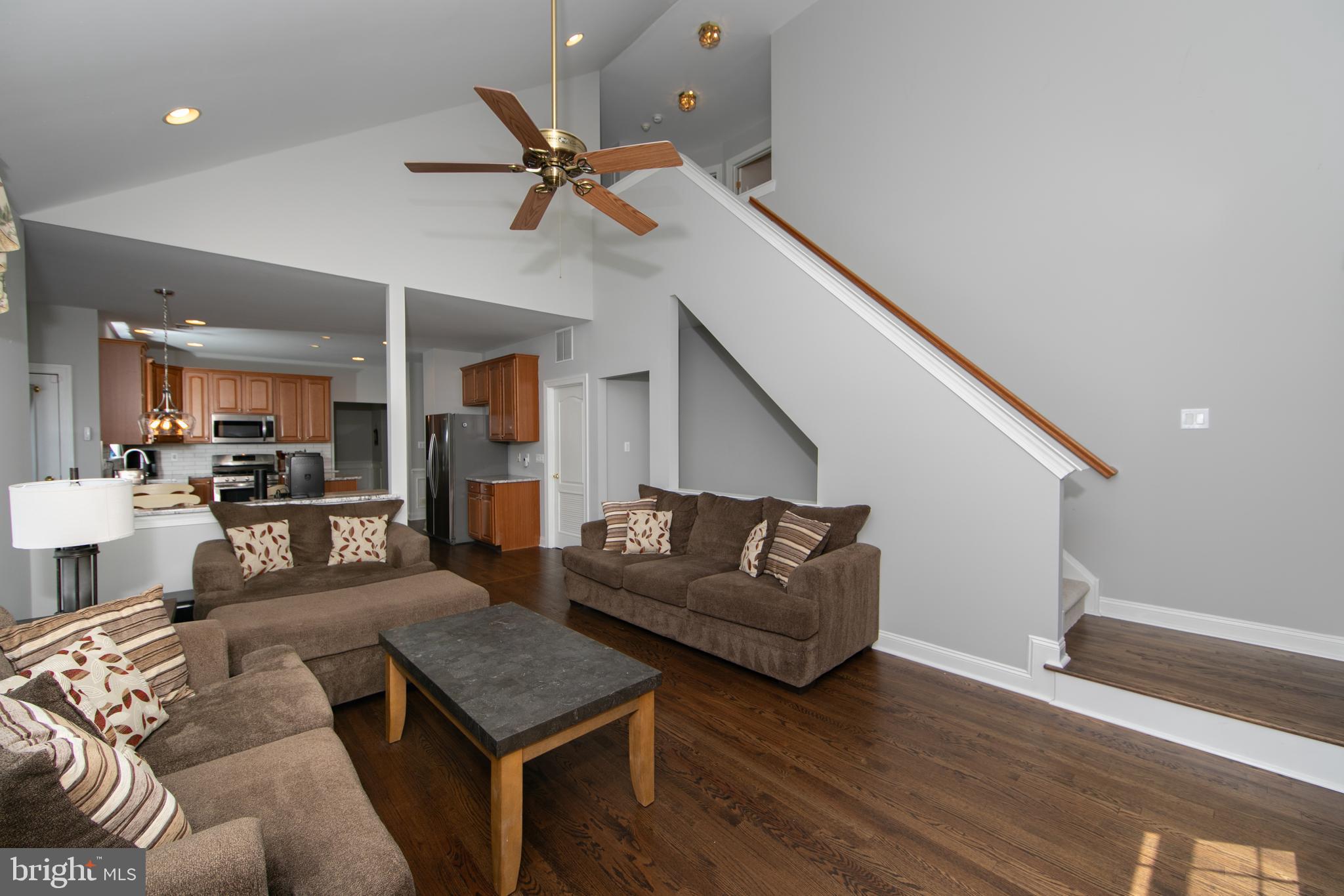 7 Kyle Court Mount Laurel, NJ 08054 - Photo 28 of 67 a living room with furniture kitchen view and a wooden floor