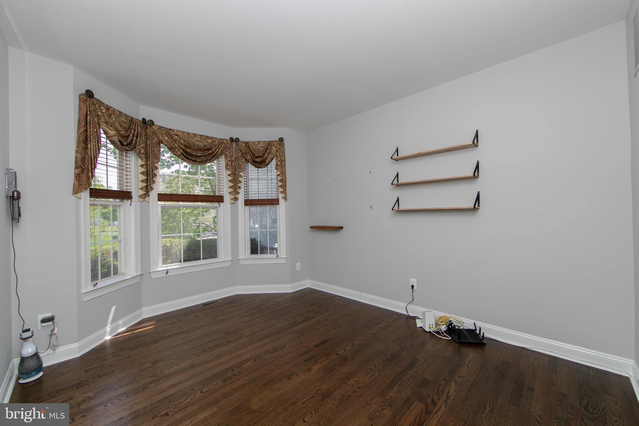 7 Kyle Court Mount Laurel, NJ 08054 - Photo 31 of 67 a view of wooden floor and windows in a room
