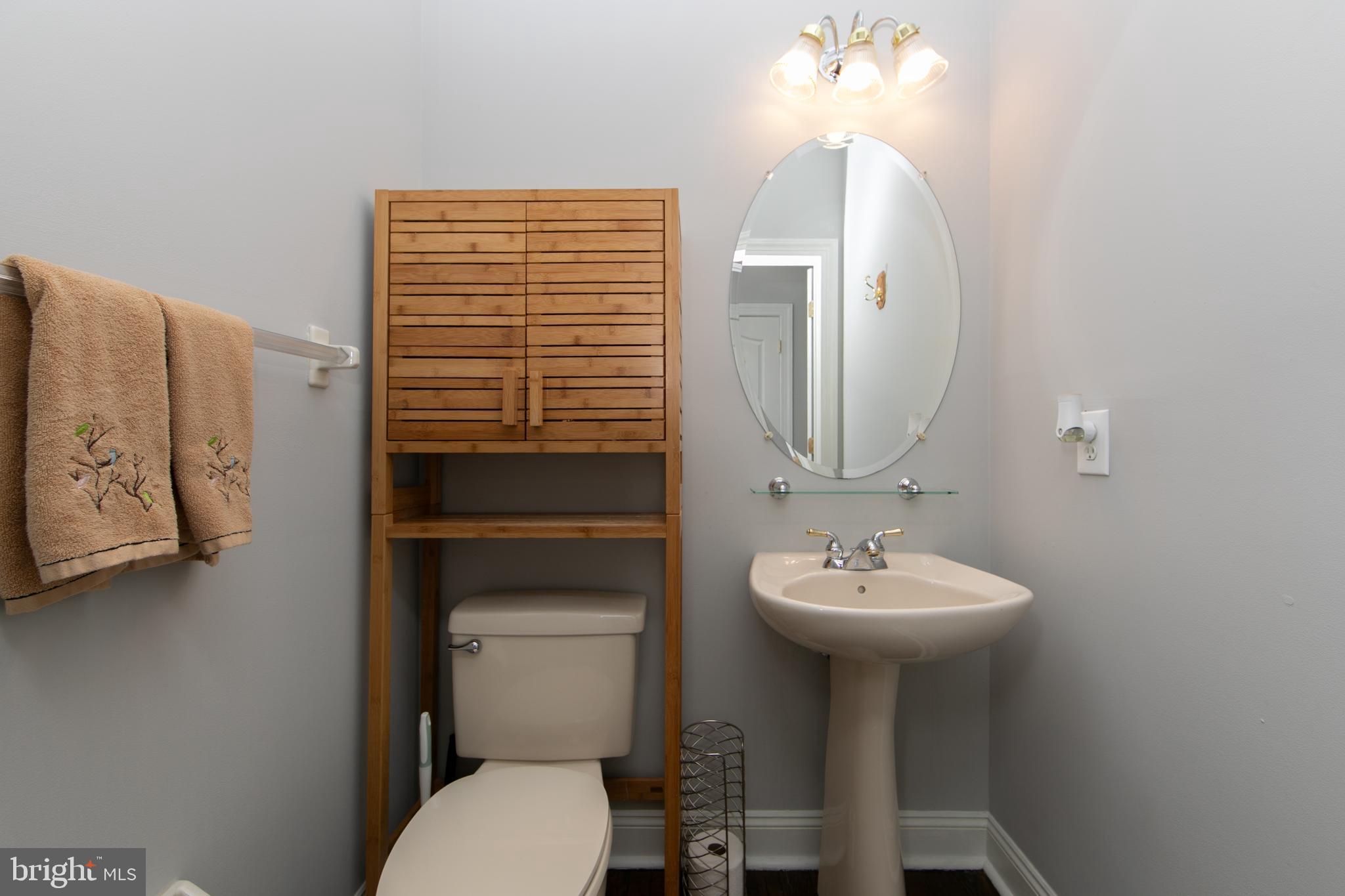 7 Kyle Court Mount Laurel, NJ 08054 - Photo 32 of 67 a bathroom with a sink a mirror and a toilet