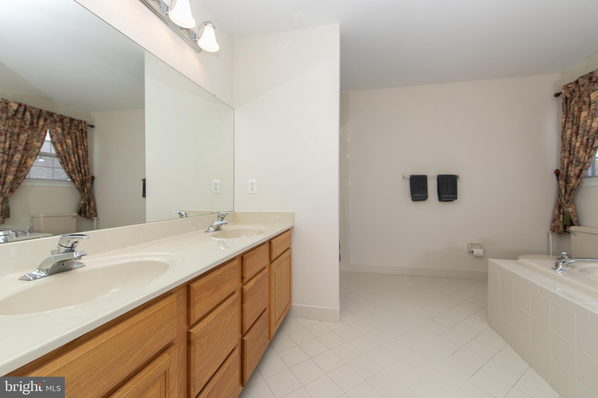 7 Kyle Court Mount Laurel, NJ 08054 - Photo 37 of 67 a bathroom with a sink and a mirror