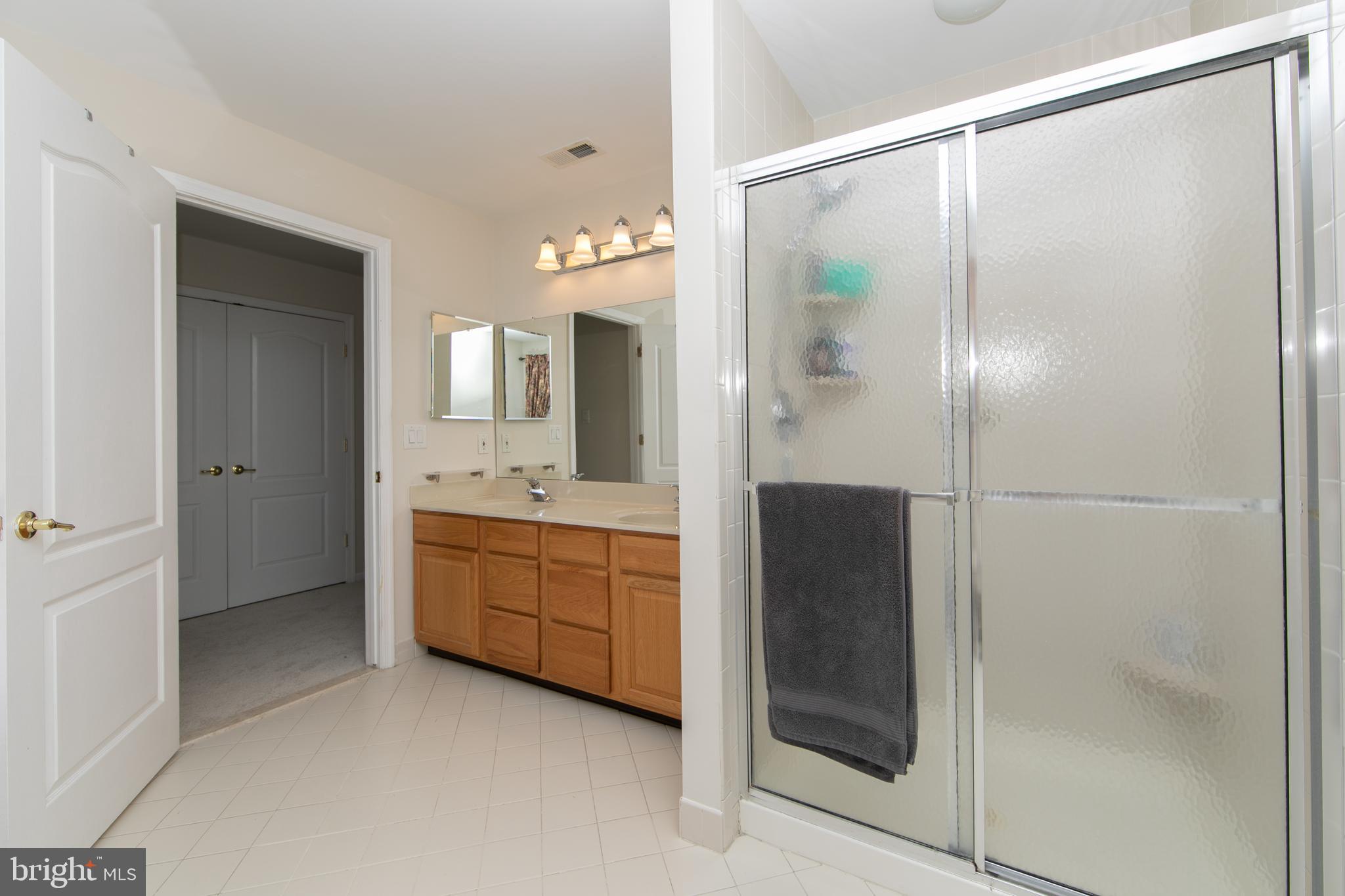 7 Kyle Court Mount Laurel, NJ 08054 - Photo 38 of 67 a bathroom with a granite countertop sink mirror and shower