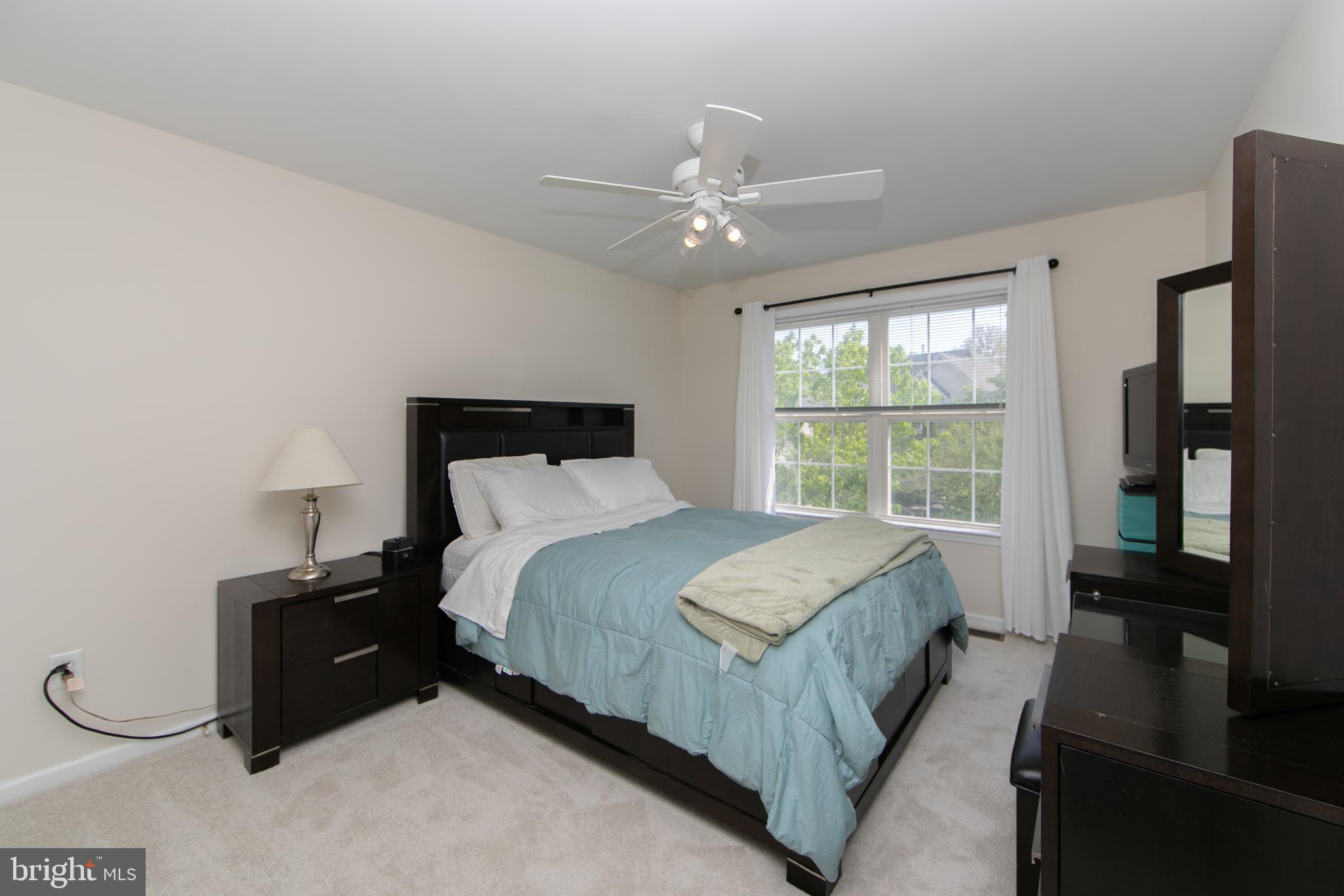 7 Kyle Court Mount Laurel, NJ 08054 - Photo 41 of 67 a bedroom with a bed and a tv