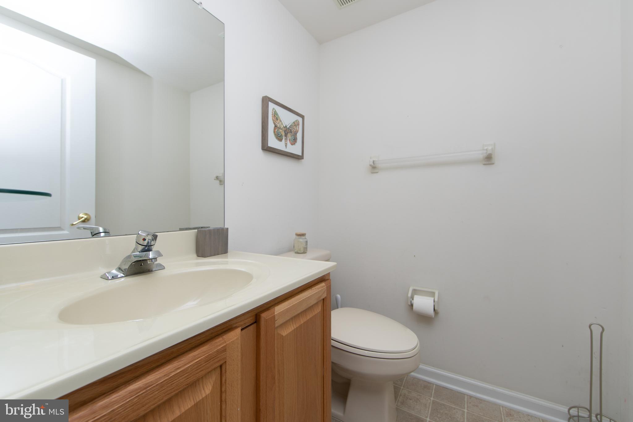 7 Kyle Court Mount Laurel, NJ 08054 - Photo 60 of 67 a bathroom with a sink a toilet and mirror