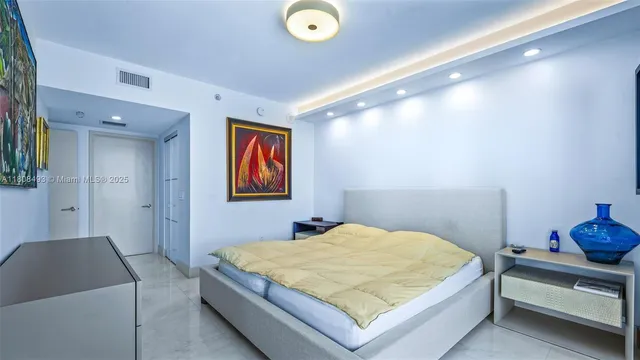 a living room with couch and a table