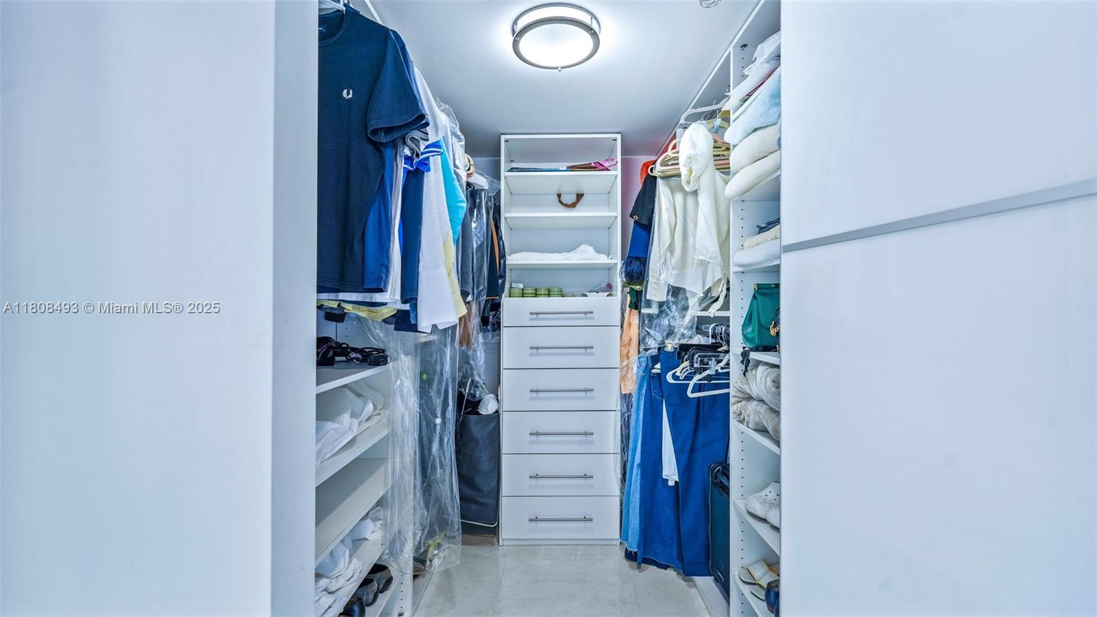 185 Southwest 7th Street, Unit 2911 Miami, FL 33130 - Photo 22 of 33 a view of walk in closet