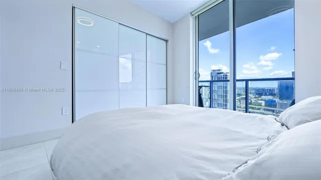 a bathroom with a sink vanity and a toilet