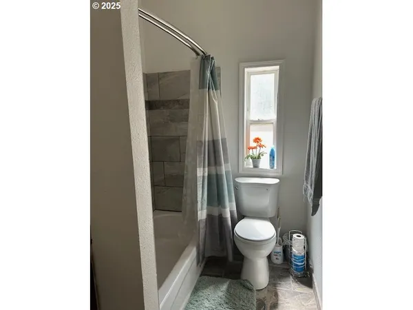 a bathroom with a toilet