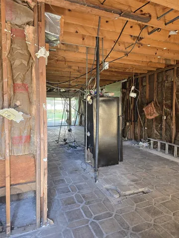 a view of a room with glass door