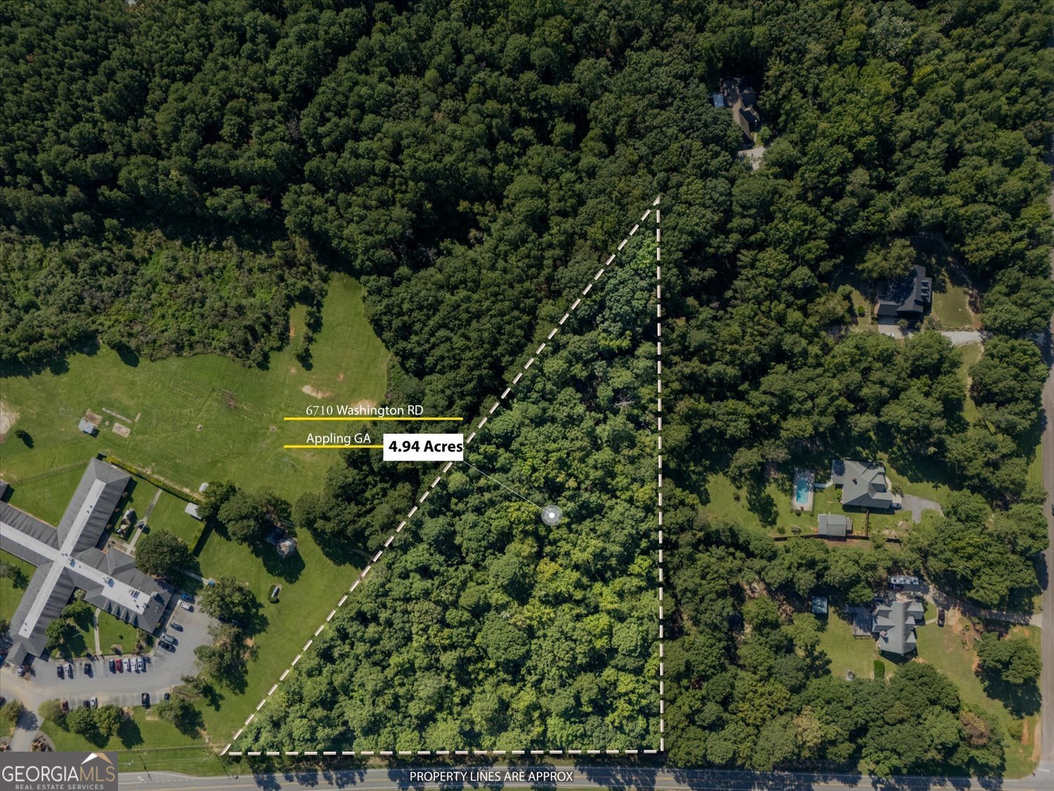 6710 Washington Road Appling, GA 30802 - Photo 5 of 7 an aerial view of a house with a yard