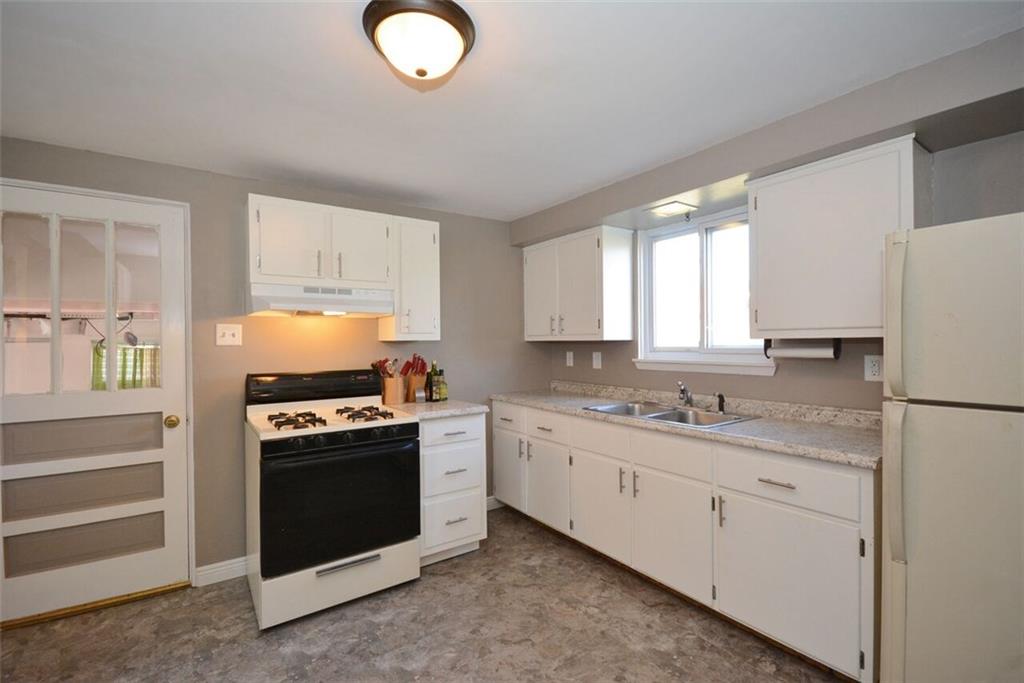 715 Center Street Harwick, PA 15049 - Photo 6 of 20 New flooring in ample sixed kitchen.