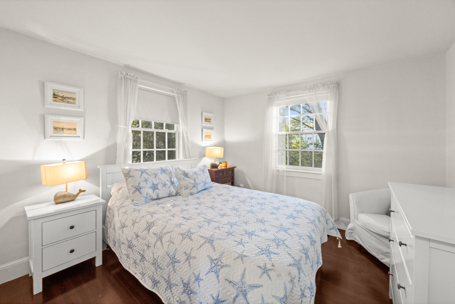 9 Fowler Avenue Edgartown, MA 02539 - Photo 15 of 27 a bedroom with a bed and a window