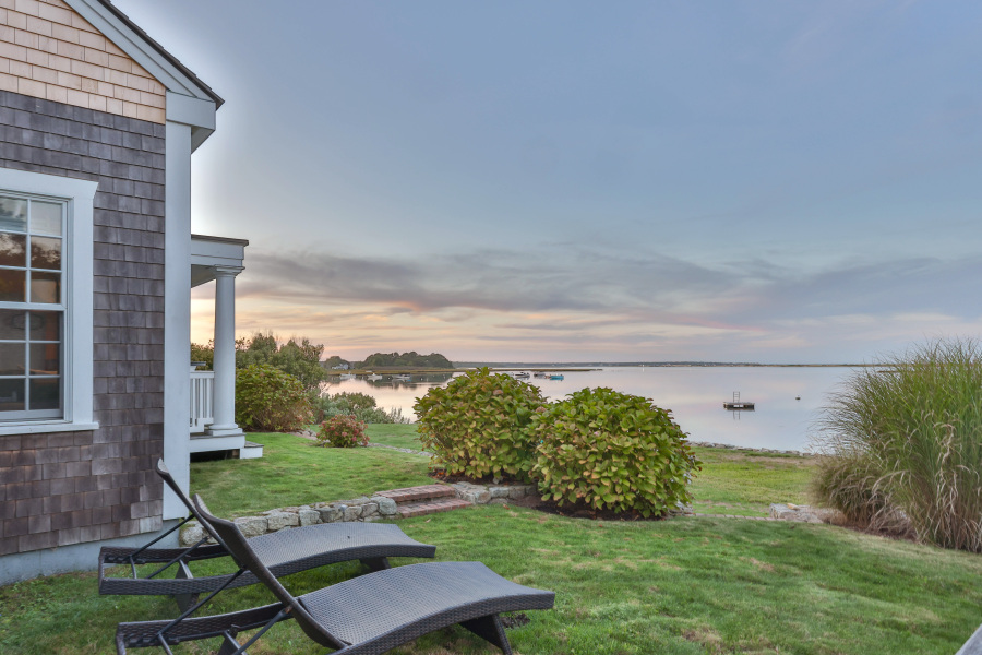 9 Fowler Avenue Edgartown, MA 02539 - Photo 4 of 27 a view of a backyard with plants