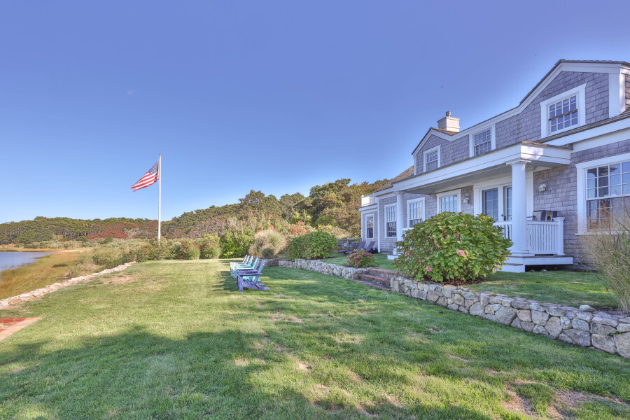9 Fowler Avenue Edgartown, MA 02539 - Photo 5 of 27 a view of a house with a yard and a garden