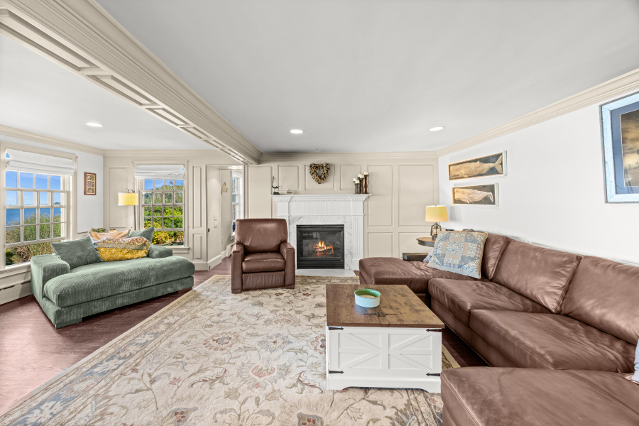 9 Fowler Avenue Edgartown, MA 02539 - Photo 8 of 27 a living room with furniture and a fireplace