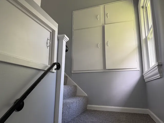 a bathroom with a bathtub and shower