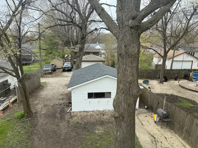a house view with a backyard space