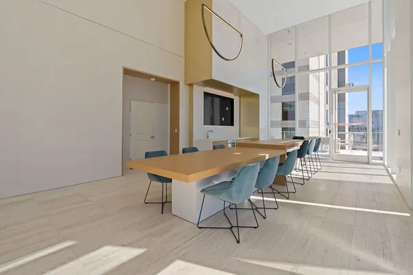 a view of a livingroom with furniture and a flat screen tv