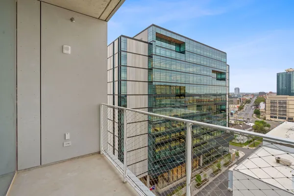a balcony view with an outdoor space