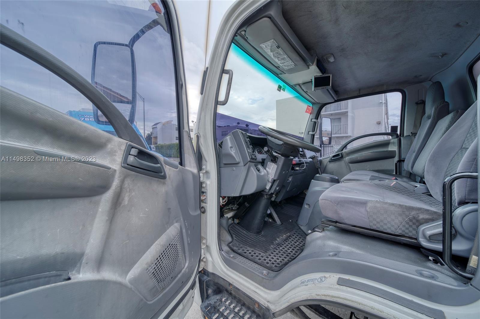 Tire Mobile Business For Sale In Miami Miami, FL 33196 - Photo 16 of 19 a living room with furniture