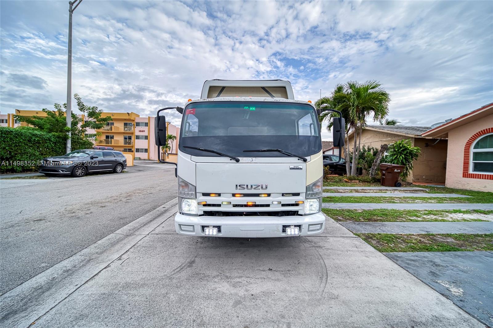 Tire Mobile Business For Sale In Miami Miami, FL 33196 - Photo 2 of 19 a car parked in front of a house