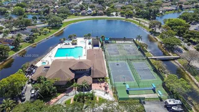 an aerial view of a house with a garden
