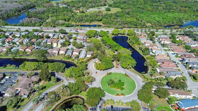 an aerial view of a golf course with a garden