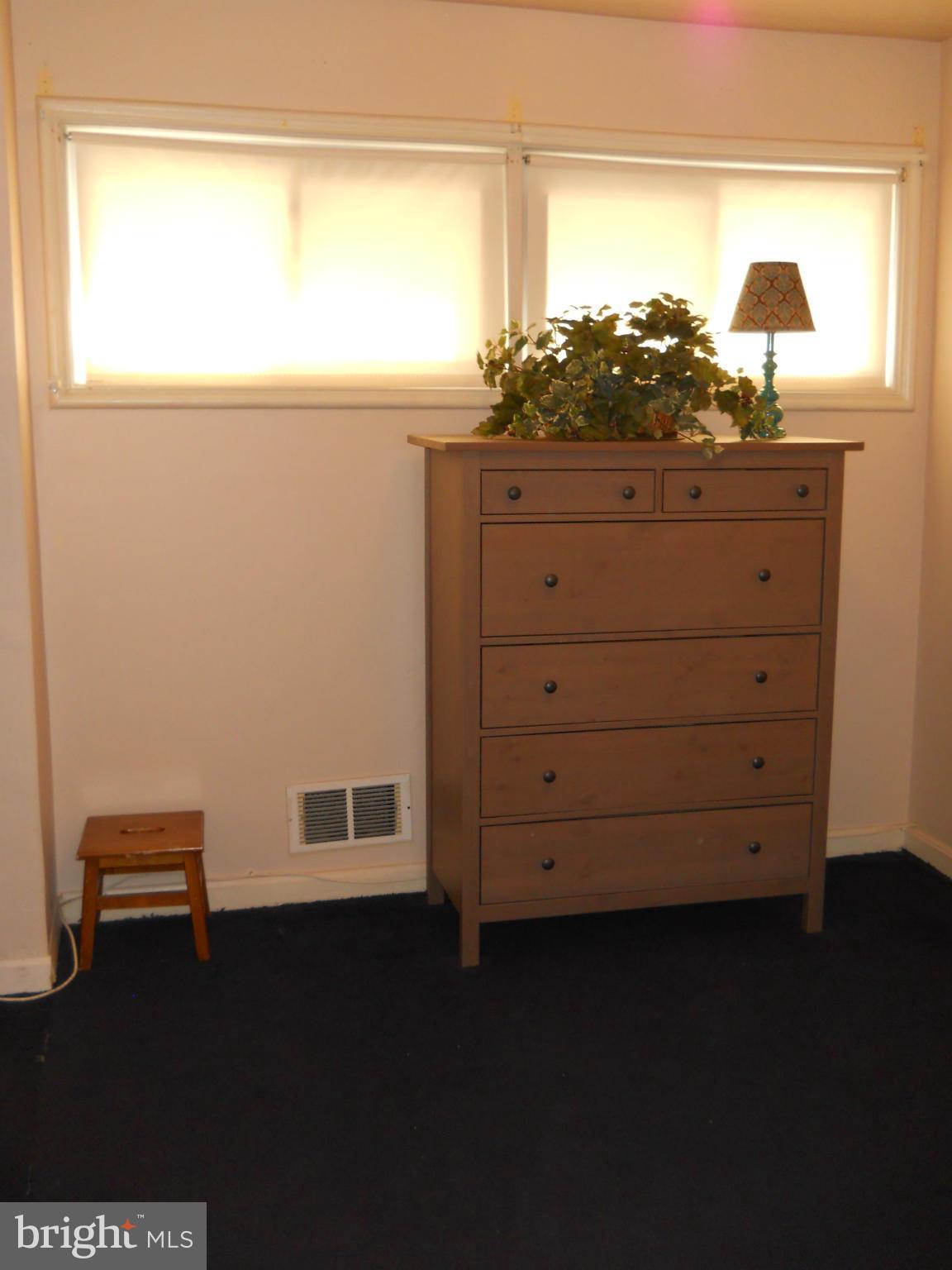 7411 Sudbrook Road Baltimore, MD 21208 - Photo 24 of 30 a view of a dresser