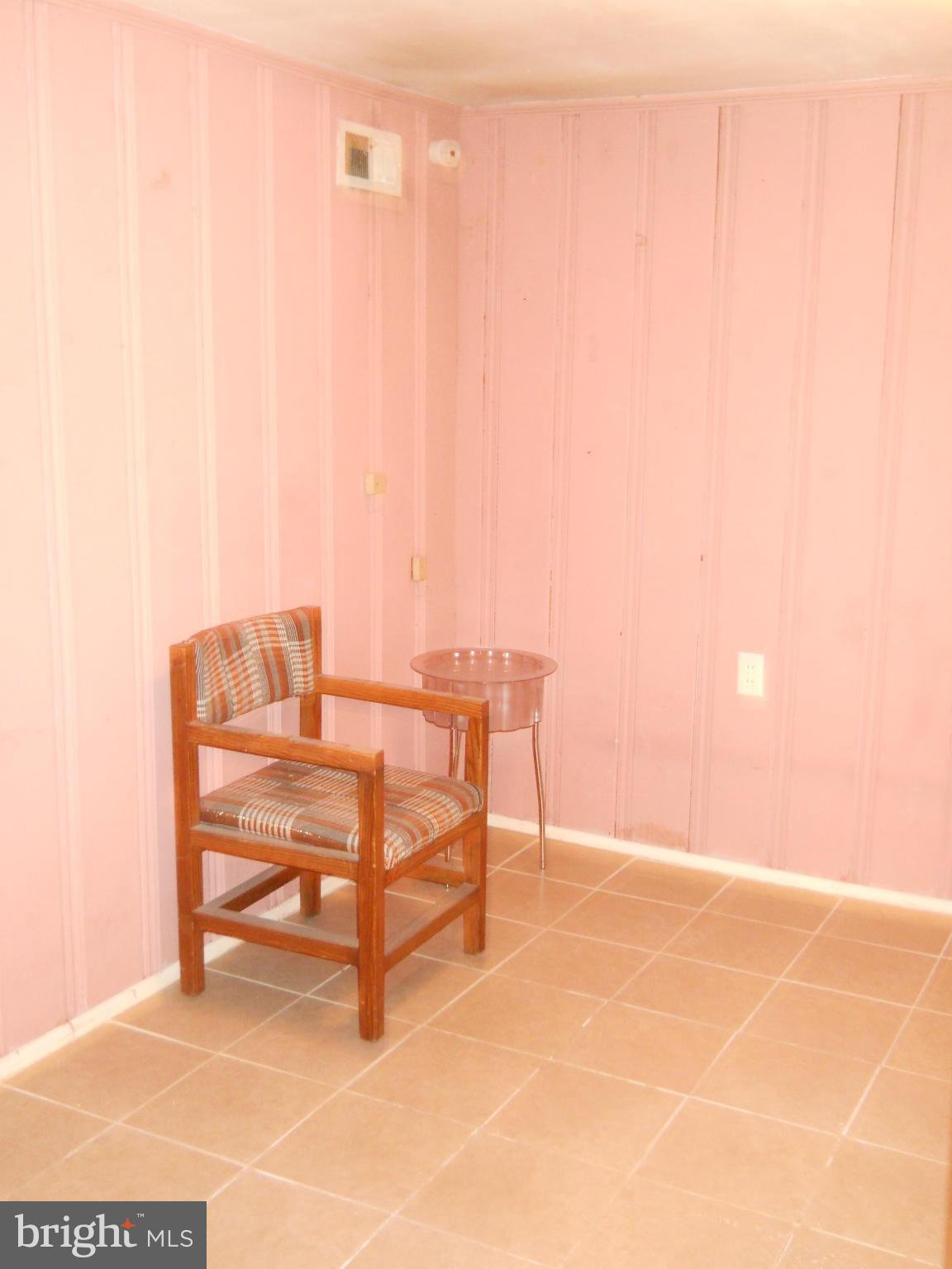 7411 Sudbrook Road Baltimore, MD 21208 - Photo 25 of 30 a view of dining room with furniture and wooden floor