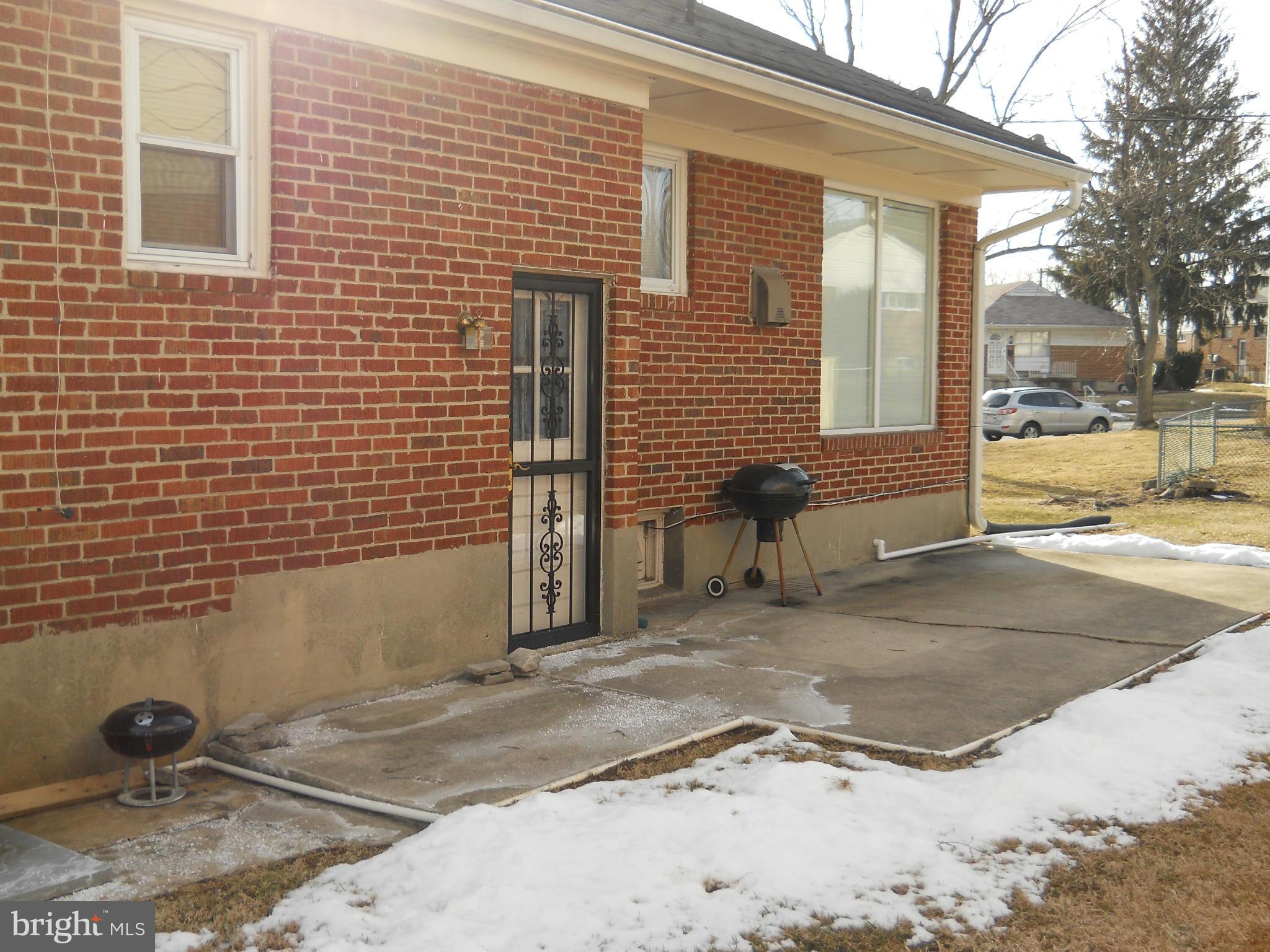 7411 Sudbrook Road Baltimore, MD 21208 - Photo 30 of 30 a view of a house with a yard