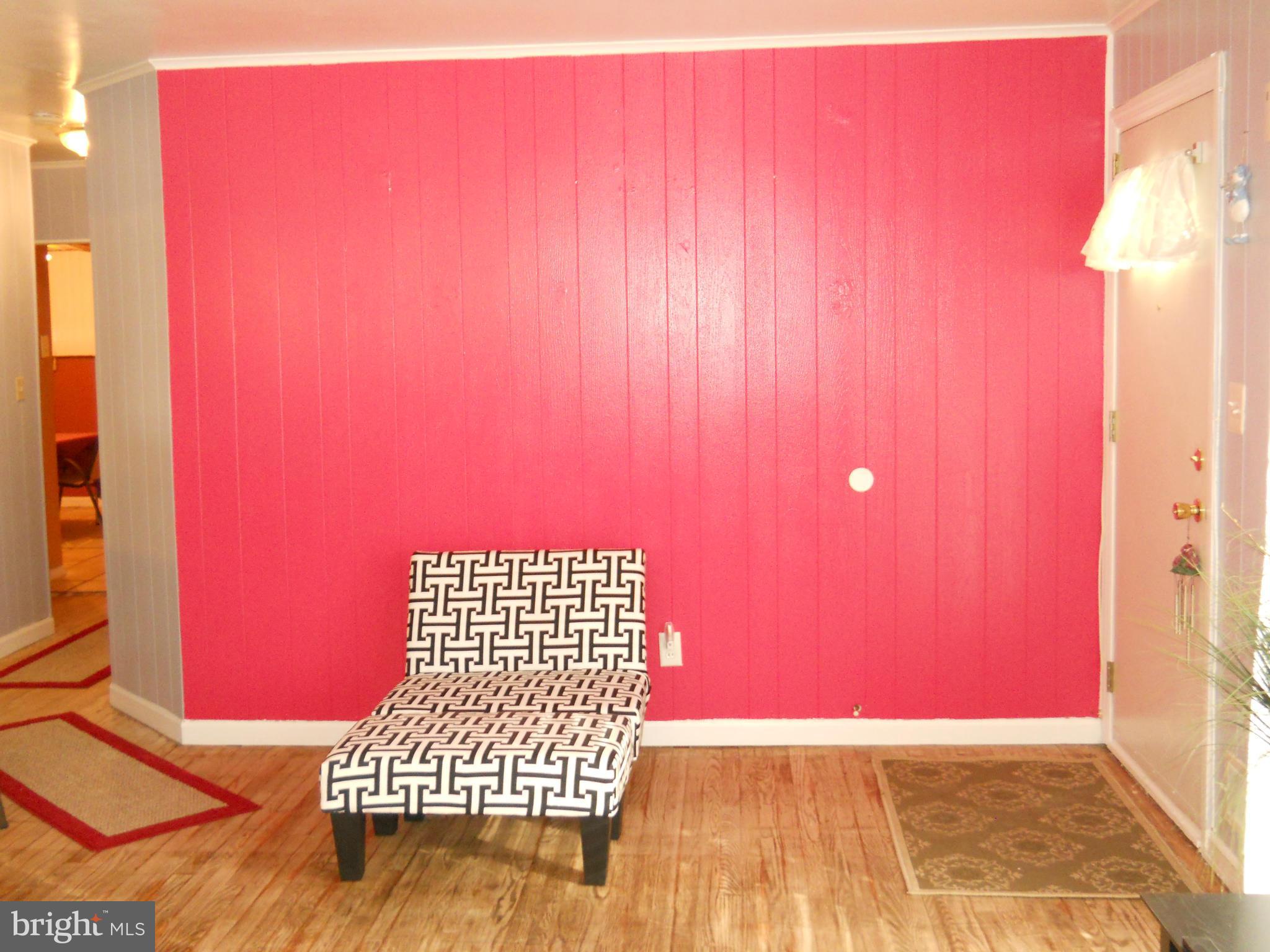 7411 Sudbrook Road Baltimore, MD 21208 - Photo 10 of 30 a view of empty room with wooden floor