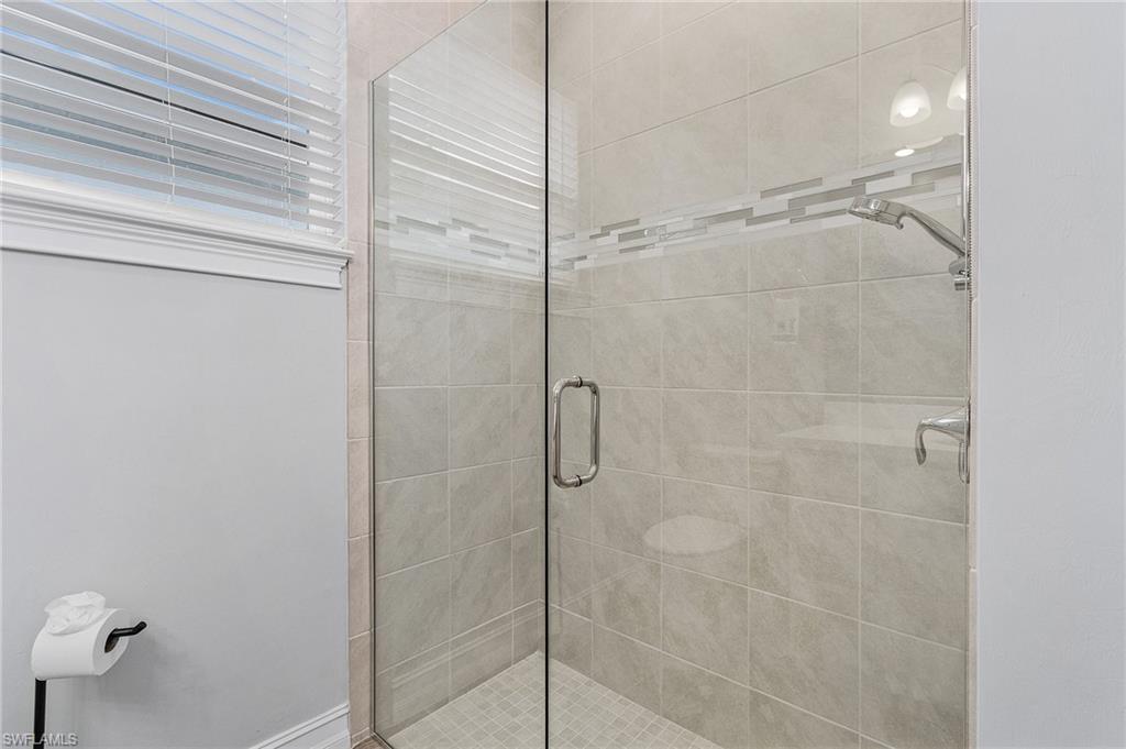 28367 Captiva Shell Loop Bonita Springs, FL 34135 - Photo 20 of 36 a bathroom with a shower