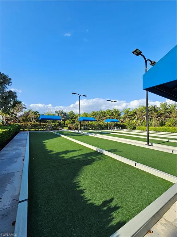 28367 Captiva Shell Loop Bonita Springs, FL 34135 - Photo 26 of 36 a view of a golf course with a lake