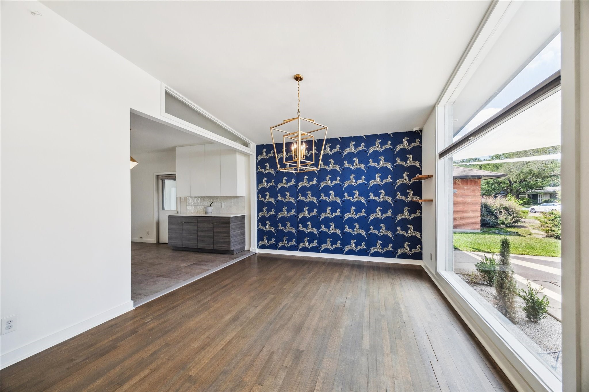 5231 Lamonte Lane Houston, TX 77092 - Photo 6 of 41 a view of wooden floor in an empty room with a window