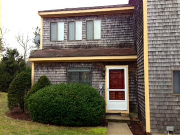 71 Round House Road, Unit 71 Bourne, MA 02532 - Photo 1 of 25 a front view of a house with plants