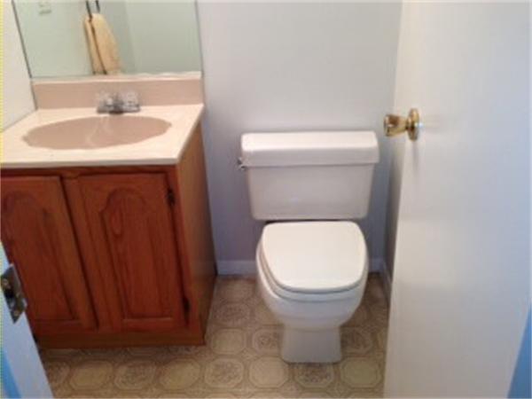 71 Round House Road, Unit 71 Bourne, MA 02532 - Photo 11 of 25 a bathroom with a sink and toilet