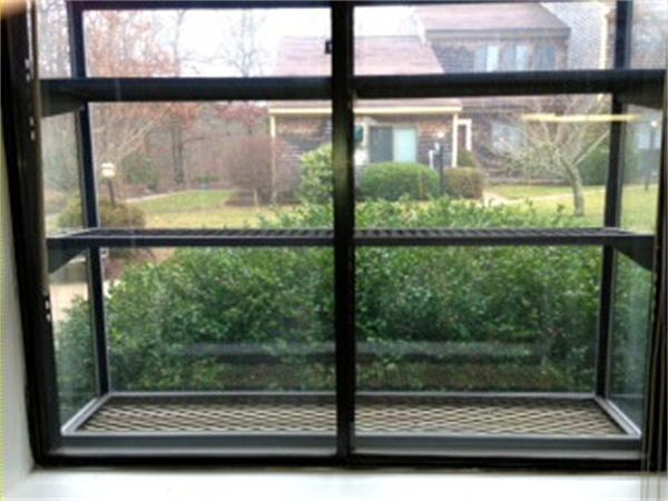 71 Round House Road, Unit 71 Bourne, MA 02532 - Photo 3 of 25 a view of backyard from a window
