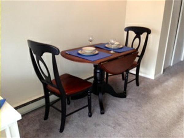 71 Round House Road, Unit 71 Bourne, MA 02532 - Photo 5 of 25 a view of a dining room with furniture and window