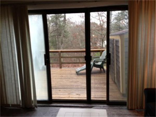 71 Round House Road, Unit 71 Bourne, MA 02532 - Photo 8 of 25 a view of a floor to ceiling window and a floor to ceiling window
