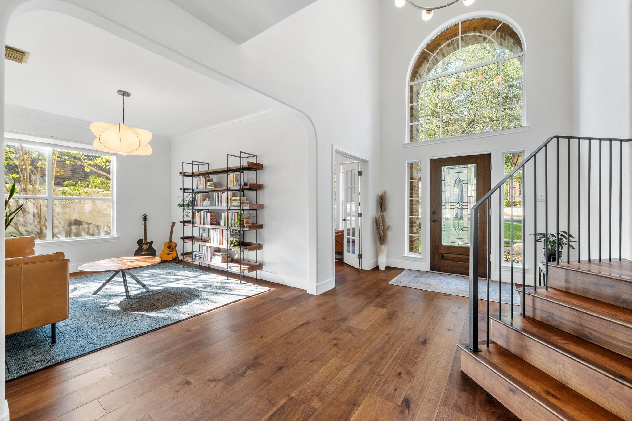 3417 Grimes Ranch Road Austin, TX 78732 - Photo 2 of 40 a living room with furniture and a large window