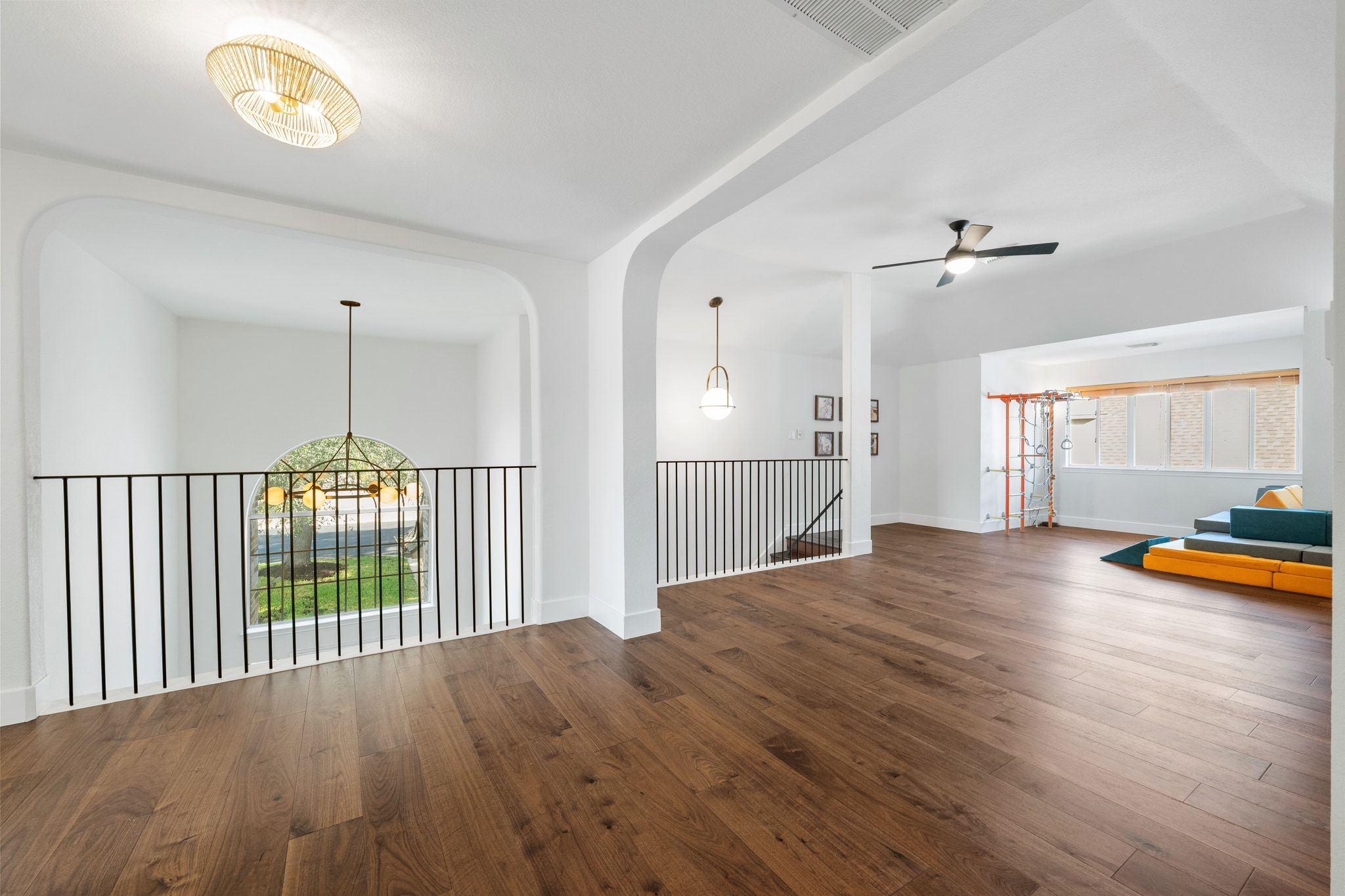 3417 Grimes Ranch Road Austin, TX 78732 - Photo 23 of 40 a view of a room with wooden floor and window