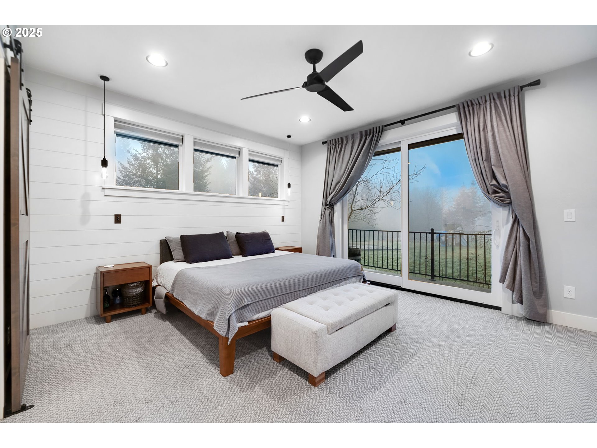 17211 Northeast Yacolt Mountain Road Yacolt, WA 98675 - Photo 17 of 44 a bed room with a bed and a ceiling fan