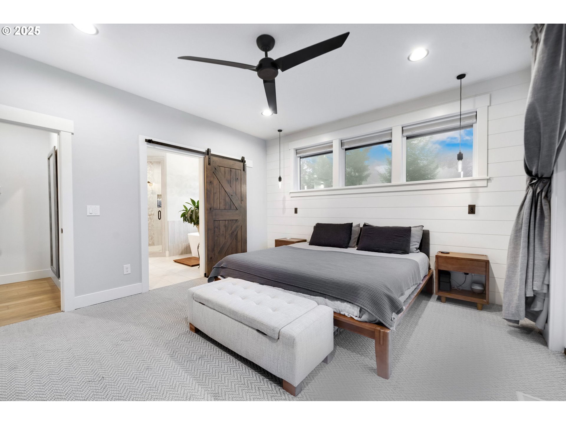 17211 Northeast Yacolt Mountain Road Yacolt, WA 98675 - Photo 18 of 44 a bedroom with a bed a mirror and lamp