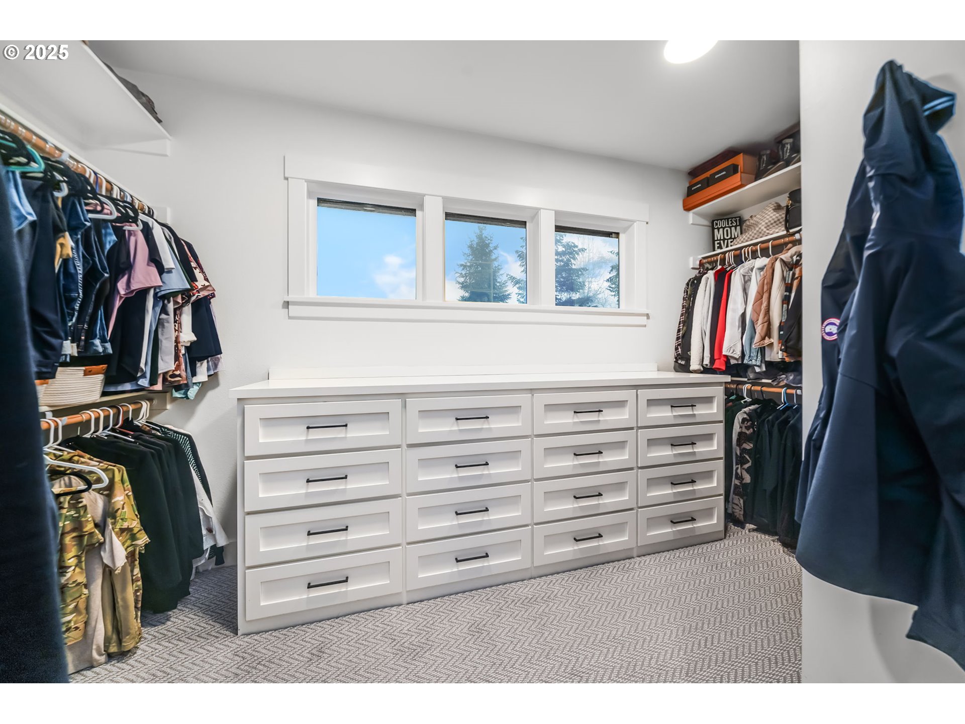 17211 Northeast Yacolt Mountain Road Yacolt, WA 98675 - Photo 22 of 44 a view of walk in closet with clothes and shoes