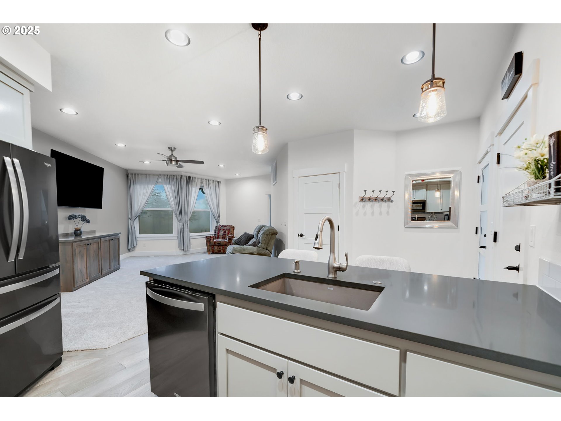 17211 Northeast Yacolt Mountain Road Yacolt, WA 98675 - Photo 34 of 44 a kitchen with stainless steel appliances a sink stove and refrigerator
