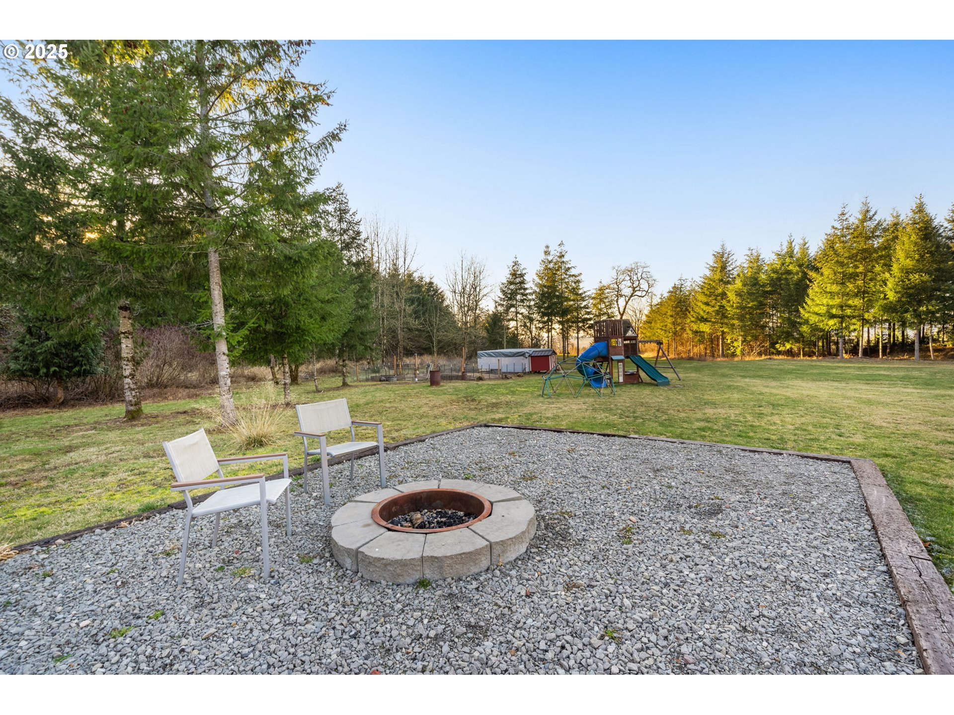 17211 Northeast Yacolt Mountain Road Yacolt, WA 98675 - Photo 41 of 44 a view of a backyard with swimming pool