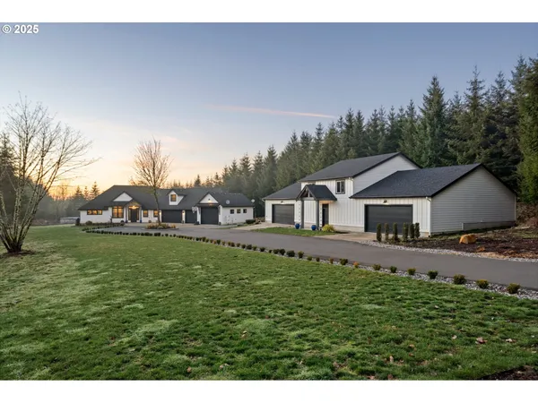 a view of a house with a big yard